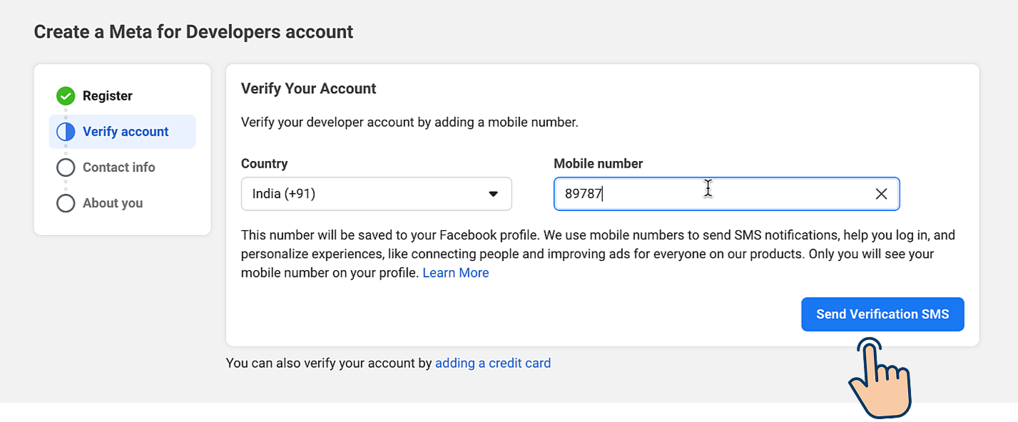Meta for Developers "Verify Your Account" form showing a Country dropdown set to India (+91), a Mobile number field with a partial number entered, and a "Send Verification SMS" button highlighted by a cursor.