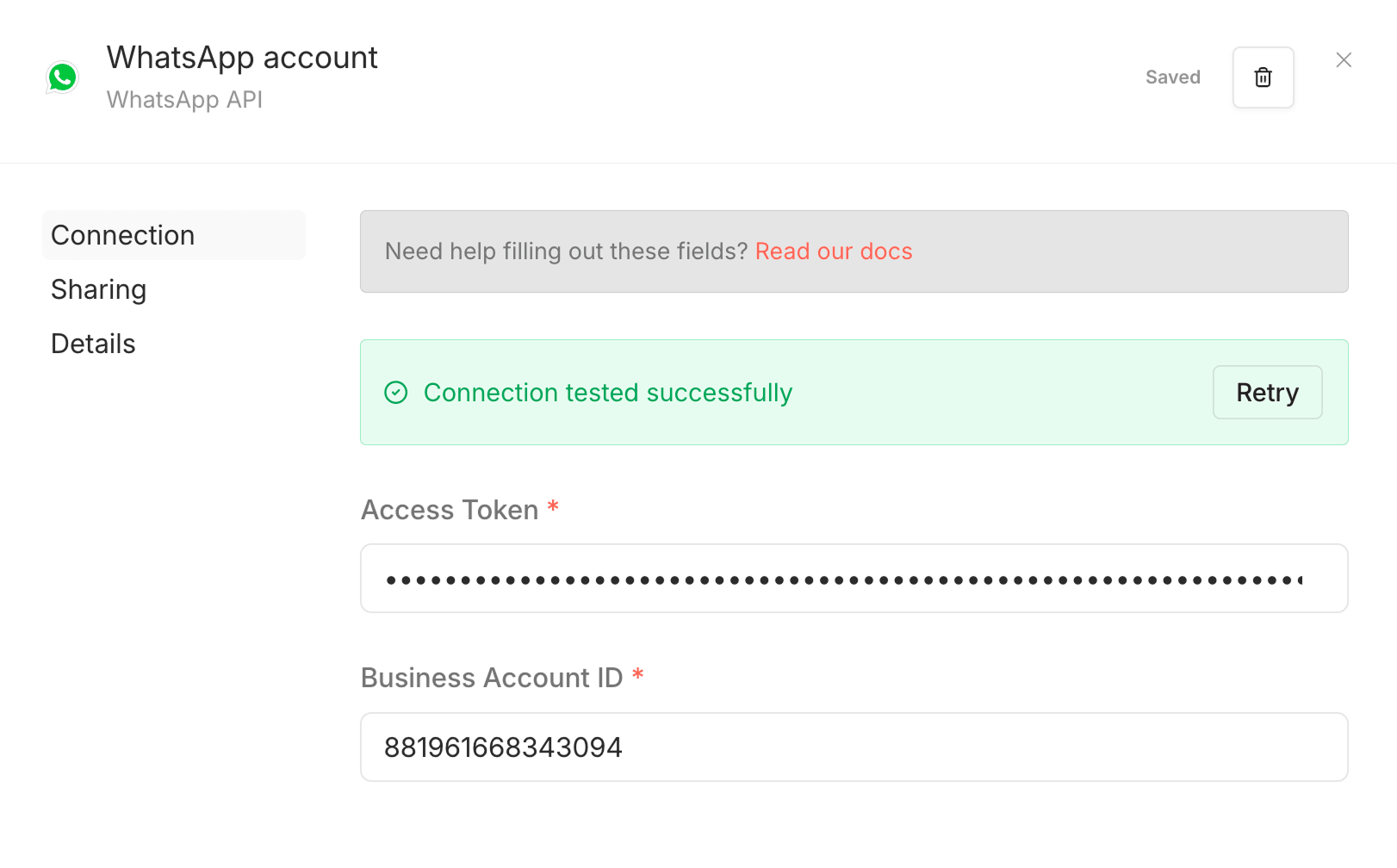 n8n WhatsApp API credentials panel showing a "Connection tested successfully" confirmation, with masked Access Token and Business Account ID fields filled in.