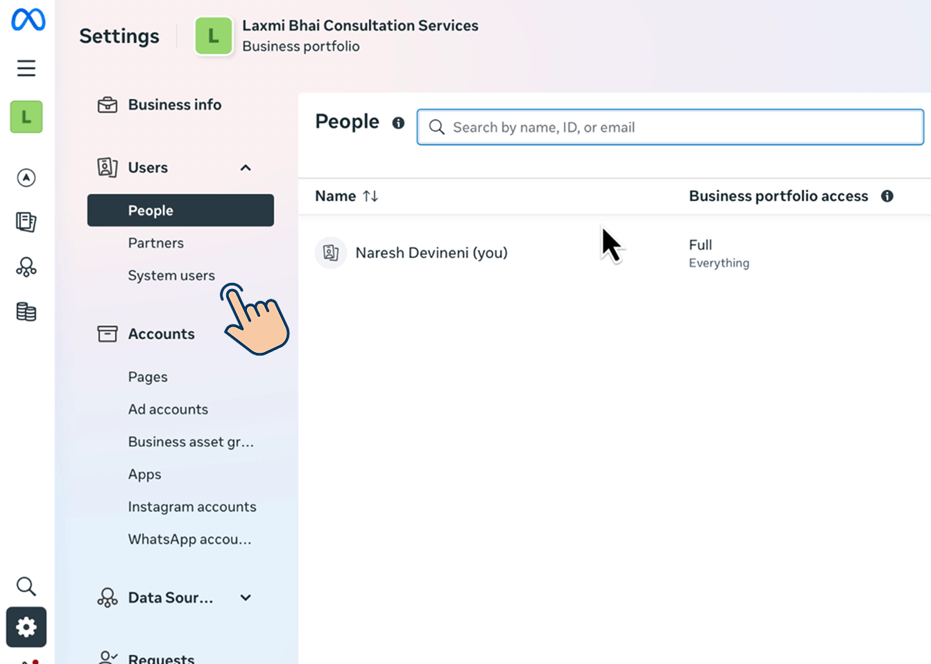 Facebook Business Settings sidebar with the Users section expanded, showing a hand cursor pointing at the "System users" link.