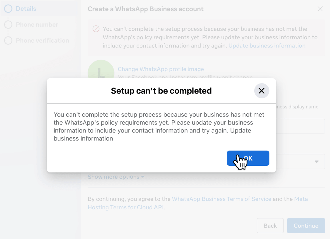 Error dialog reading "Setup can't be completed" during WhatsApp Business account creation, stating the business has not met WhatsApp's policy requirements and prompting the user to update business information.