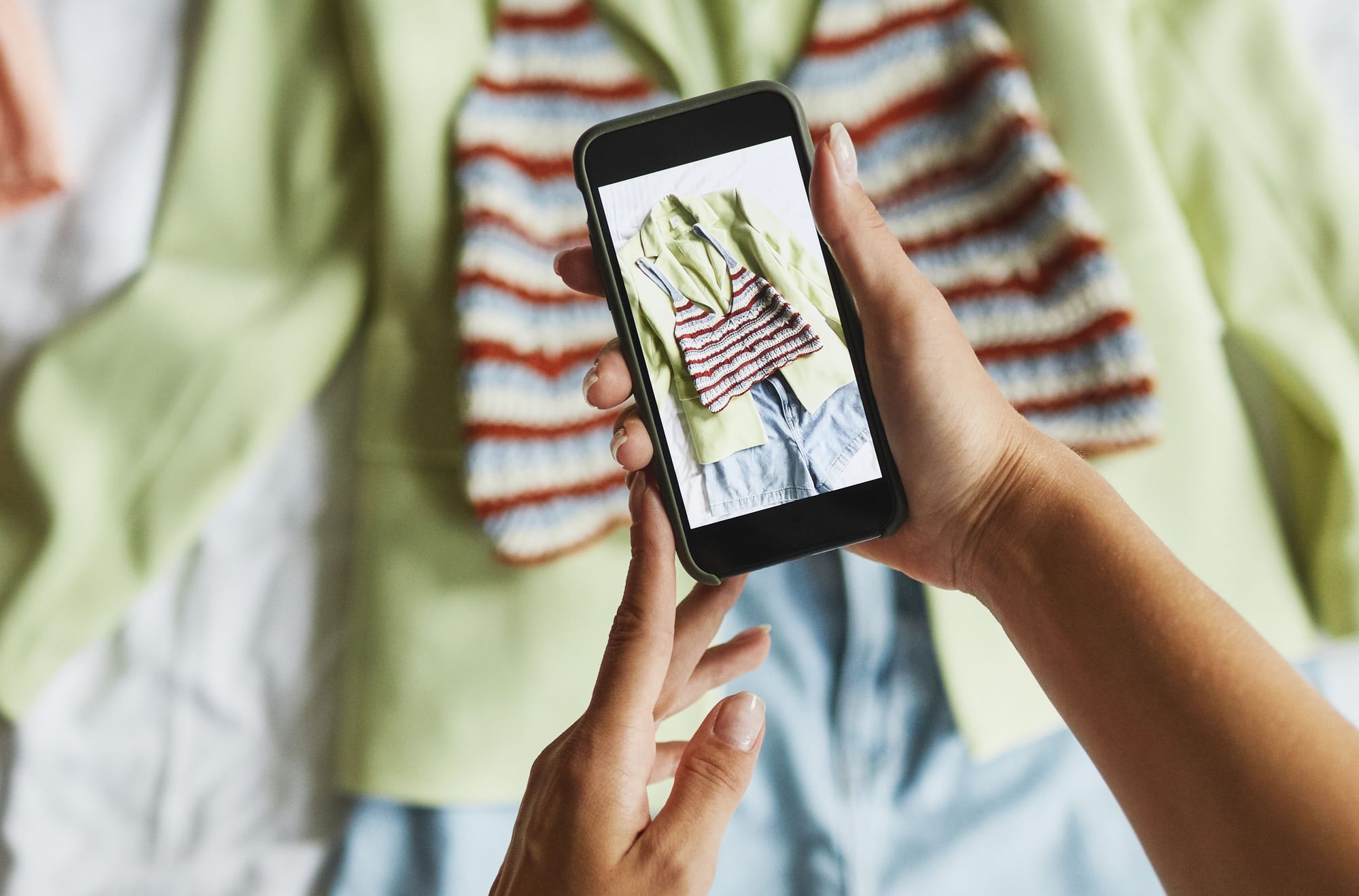 UGC content library showing rights-cleared customer photos and videos organised by product from Shopify orders