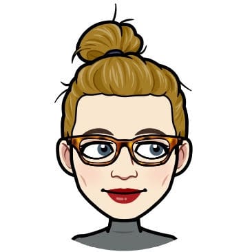 A cartoon headshot of Maggie Oates. A white femme with glasses and a messy bun.