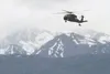 An Alaska Army National Guard UH-60 Black Hawk helicopter approaches Malemute Drop Zone during airborne training at Joint Base Elmendorf-Richardson, Alaska, May 30, 2018. Airmen from the 3rd 