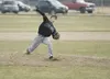 Colony junior Damon Hammer fires a pitch Saturday during the
Knights’ game against Homer. Hammer hit a home run against Kodiak
on Friday. ROBERT DeBERRY/Frontiersman
