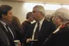 Triad Hospitals Inc. Chief Executive Officer Denny Shelton,
center, speaks with Valley Hospital Association Board member Vince
Curry, left, and Director of Nursing Lynn Wagoner, right, at
Mon