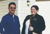 Michael Tucker, president of Knik Tribe and Stephanie Holcomb stand in front of one of two new duplexes the tribe built using federal housing funds, in partnership with Premier Builders of Wa