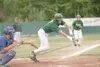 ROBERT DeBERRY/Frontiersman Mat-Su Miner Gunnar Terhune goes for
a bunt Friday against the Glacier Pilots at Hermon Brothers
Field.