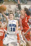 ROBERT DeBERRY/Frontiersman Palmer Moose T.J. Fullmer goes up
for two points as Wasilla Warrior Adrese Lavern goes for the block
during Saturday's game at Palmer High School. Fullmer hit four