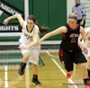 Colony's Ella Smith and Kenai's Hannah Drury chase a loose ball during a Colony girls basketball win over Kenai Jan. 8 at Colony High School. Courtesy Bruce Eggleston/matsusports.net
