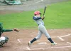 MATT TUNSETH/Frontiersman Alaska shortstop Josh Boring hits an
RBI single during the Road Warriors’ 12-5 win over the Service
Cougars during the first round of the Alaska American Legion Stat
