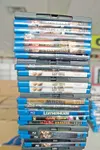 A stack of Blu-ray discs sit on the counter at Movie Gallery
waiting to be scanned and moved to the new Home Town Video store
opening in Palmer in early August. (ROBERT
DeBERRY/Frontiersman)