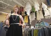 Younique Boutique owner Megan Vincent stands inside her designer consignment store in the Meta Rose Square shopping center in Wasilla. Vincent began taking in items and reselling them five ye