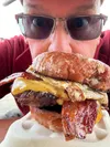 Frontiersman contributor Mark Kelsey faced the donut burger. Courtesy photo