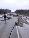 A stretch of Vine Road near Wasilla sustained major damage during an earthquake that hit Southcentral Alaska Friday morning. Dennis Anderson/Frontiersman