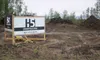 H5 Construction has bought and cleared a 1.6-acre lot near its recently completed Frazier’s Way Business Park development on Bogard Road with the hopes of adding to the retail office space al