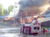 Photo courtesy of Ashley Evans Flames rip through Susitna Valley
Jr./Sr. High School Tuesday night. Witnesses reported smoke in the
area about 7 p.m. Tuesday, and the fire continued to burn i