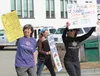 Marchers, including organizers Michelle Schuman, right, and Ruth Hulbert, rear, march through the streets of downtown Palmer on Saturday afternoon. Nearly 400 took part in the march coordinat