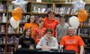 Levi Hopkins, center, celebrates with his family during a ceremny to recognize the Colony High senior’s chance to wrestle for Division I Campbell University. Hopkins’ older brother Caleb is a