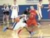 Palmer sophomore James Nisbett tries to work his way around
Wasilla senior Dillon Ferro during the Warriors’ 55-41 win over the
Moose Tuesday at Palmer High. BRUCE EGGLESTON/matsusports.net