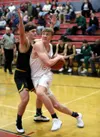 Wasilla's Andrew Devine makes a move at the base line during a win over Service Thursday. Courtesy of Bruce Eggleston/matsusports.net