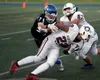 Palmer's Ezra Zimmerman makes a tackle during a win over North Pole. Bruce Eggleston/matsusports.net