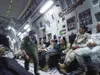 Alaska Air National Guard Tech Sgt. Thomas Hough, a loadmaster with the 249th Airlift Squadron, paces a 249 AS C-17 Globemaster III July 1, 2018, during the final stage of its ascent out of Y