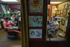 Don and Deb Yarian work work adjacent to one another at Eagle River Tattoo. Photo by James R. Evans