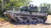 A Robotic Combat Vehicle-Medium is parked in a training area preparing to move toward its target at Fort Hood, Texas, July 26. Members of 1-7 Cav., 1st ABCT, 1st Cav. Div., are currently test
