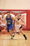 ROBERT DeBERRY/Frontiersman Palmer’s Shawna Thein and Wasilla’s
Skyler Nuss scramble for a loose ball during Thursday’s game at
Wasilla High School.