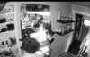 The grainy image shows the back of the head of someone who broke into the Grape Tap on June 24, 2024. Kristin Cook, owner of the Grape Tap believes that the suspect was a juvenile based on th
