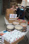 Mat-Su Regional employees enjoy a delivery of food organized by True North Recovery with contributions from Three Bears Alaska, Great Alaska Pizza Company, Knik Pizza, Kaladi Brothers Coffee,
