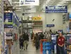 Customers shop at the new Lowe's regardless of the quiet
opening. JOEL DAVIDSON/Frontiersman