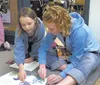 Courtesy photo Miranda Roub reads to Naomi Cote during Glacier
View School’s Love of Reading Week.