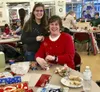Mother Julia and daughter Kali Renfro were volunteers Saturday at Santa Cop.  Barbara Hunt
