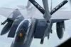 A U.S. Air Force KC-135 Stratotanker refuels an F-15E Strike Eagle assigned to the 492nd Fighter Squadron, RAF Lakenheath, in support of Exercise Baltic Operations, over Germany, June 12, 201
