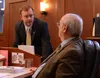 Rep. David Eastman, R-Wasilla, speaks to Rep. Craig Johnson, R-Anchorage, during a. break in debates over the state operating budget on Monday, April 3, 2023, at the Alaska State Capitol in J