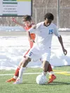 Palmer’s Sammy Dagne controls possession in the left corner of the field during a 1-1 tie with Kenai at Colony High School on Saturday. JEREMIAH BARTZ/Frontiersman
