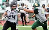 Colony senior Jon Pomrenke gets by a Service defender during a 38-0 win over the Cougars Aug. 12 in Anchorage. The Knights host Bartlett Friday at 7 p.m. at Colony High. Matt Hickman/Frontier