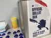 A ballot box containing absentee ballots dropped off at Anchorage City Hall is seen on Aug. 19, 2024. Andrew Kitchenman/Alaska Beacon