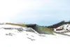 A new bridge over the railroad is part of the state's
Palmer-Wasilla Highway extension project. The bridge has been
raising eyebrows around Wasilla because of its off-kilter look. DOT
enginee