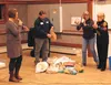 Just how much of your trash is recyclable? From left, Ailis Vann, David Sutton, Susie Hayes and Pam Huyck showed that Tuesday night at the Palmer Depot. Vann brought in a week’s worth of fami