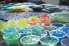 Pieces of colored window glass sit in Nickie Jordan's studio, awaiting placement on her latest mosaic. Jordan owns Central Gravel Products and does business with her creative side as Alaska G