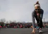 Erin Kessler leads yoga before the race Friday evening. HEATHER RESZ/Frontiersman.com