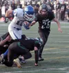 Palmer fullback Duston Corbin breaks tackles en route to the end zone during a 28-13 loss to Colony. Courtesy of Bruce Eggleston/matsusports.net