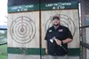 Kyle Brown stands at the Last Frontier Axe Company booth at the Alaska State Fair. Jacob Mann/Frontiersman