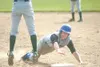 JEREMIAH BARTZ/Frontiersman Palmer’s Tim Rockey slides back into
first base during a game against Colony. Rockey was one of nine
Mat-Su Valley players named All-Southcentral Conference.