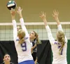Colony High School's Sophie Hall hits the ball over the reach of a Monroe Catholic blocker during the 2014 season. Hall, a senior, has signed a letter of intent to play at Western Oregon Univ
