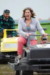 Emily Seidl (Anchorage) is scared by 4-yr-old son Charlie on the Mini Monster Trucks, Saturday, Aug. 19, 2023, at the Alaska State Fair. J. David McChesney/Frontiersman