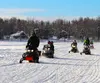 Snowmachines can be seen everywhere at the Willow State Winter Carnival, from racing to riding out over the trails, to bringing families to the event. File photo