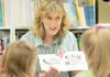 ROBERT DeBERRY/ Frontiersman Larson Elementary School Spanish
Immersion program teacher Wendy Bowen reads a Spanish storybook to
her first-grade students Thursday morning.